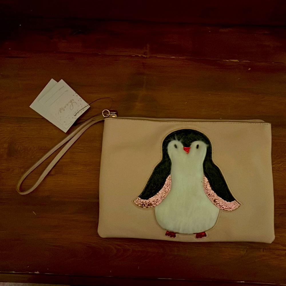 Lauren Conrad penguin wristlet